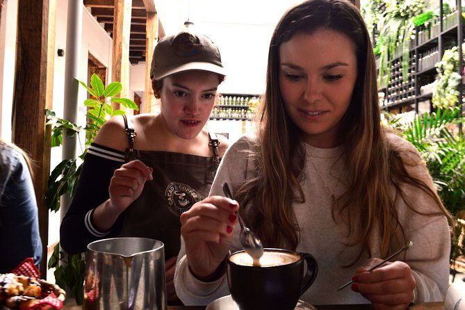 Bogota Kickstart Tour: Candelaria + Cacao & Coffee Experience •4h - Carrera 7: old-school commerce, crafts, and street creativity