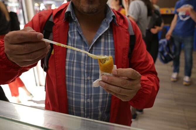 Bogota Shared Gastronomy Tour in the Historic Center - Museo del Oro to Santander Park: tamale and tropical juice with context